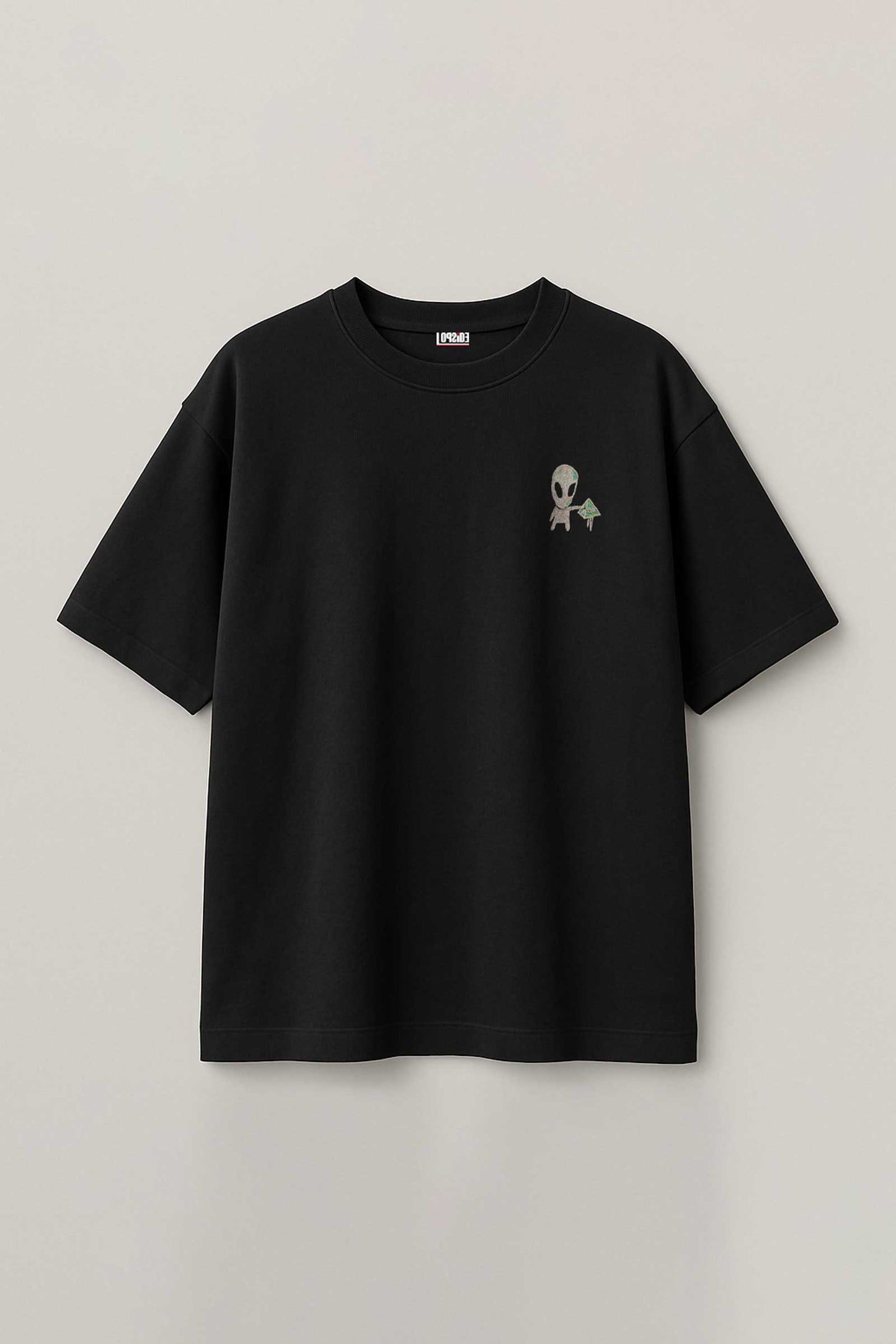Black t-shirt with a small embroidered design on a light gray background