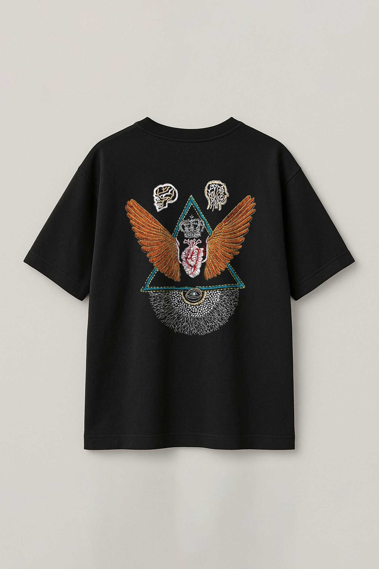 Black t-shirt with a colorful graphic design on a light gray background